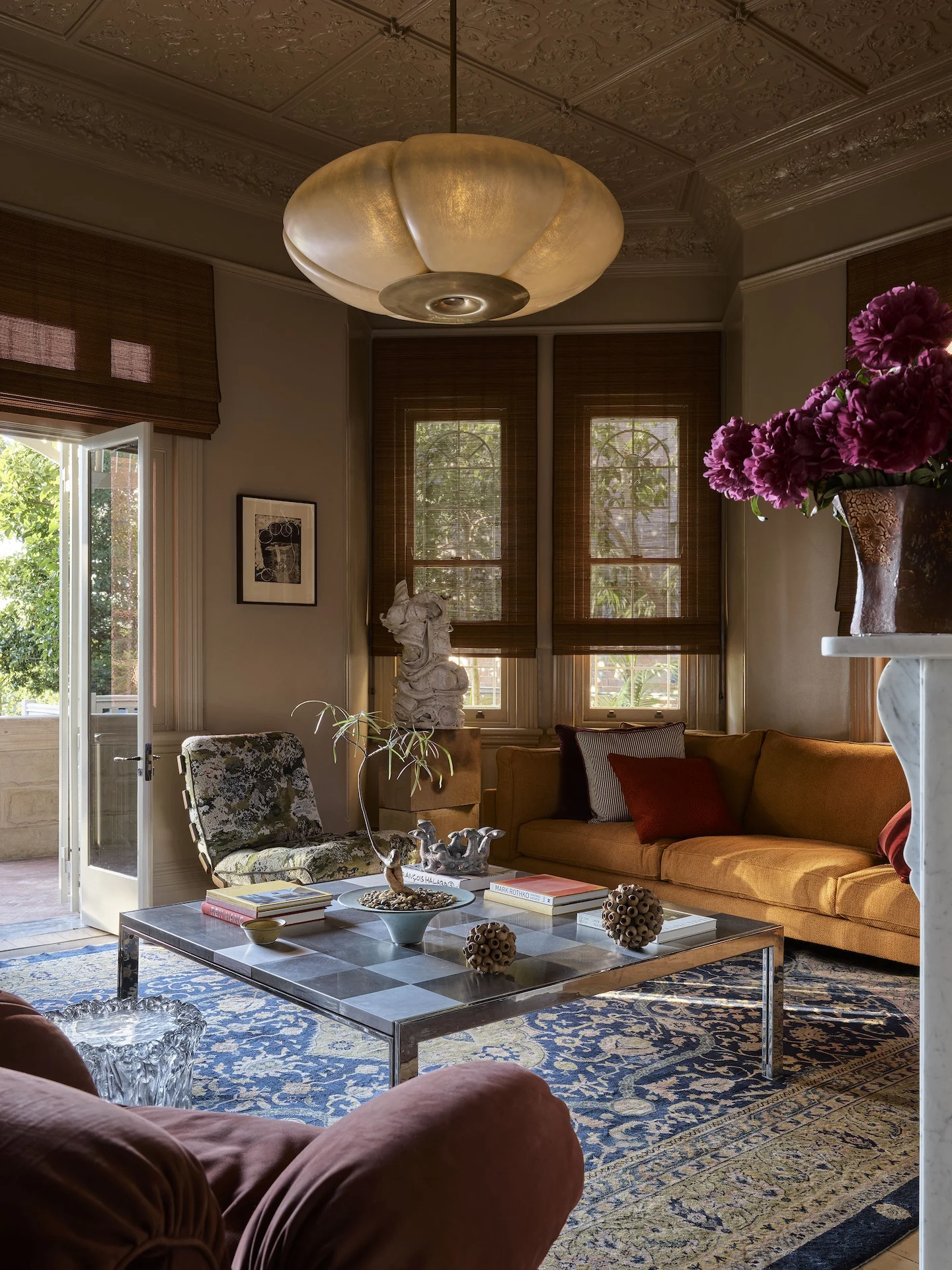Sitting room with pressed metal ceiling, woven blinds and a pendant on scene control