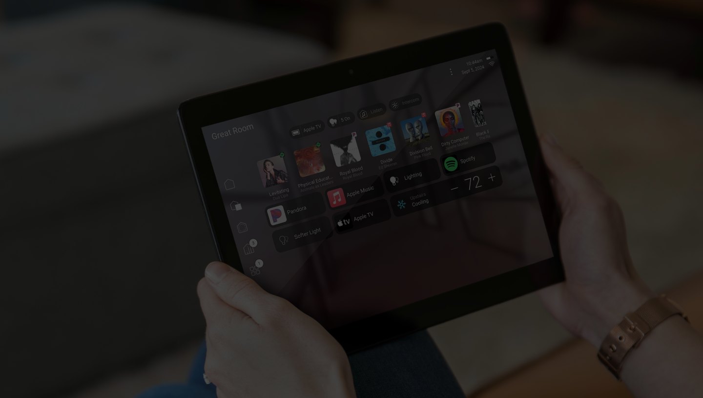 Control4 app on a tablet showing lighting, climate and security in one place